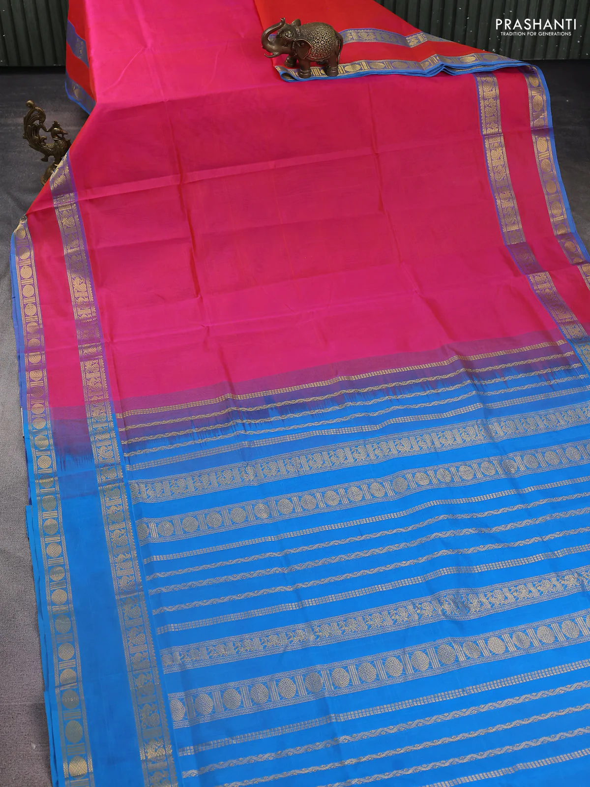Silk Cotton saree dual shade of pinkish orange and cs blue with plain body and rettapet zari woven border - Image 2