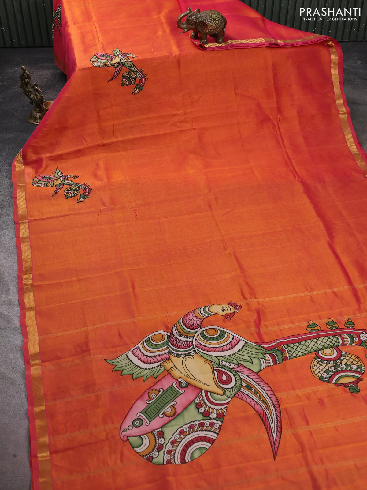 Silk cotton saree dual shade of pinkish orange with kalamkari applique work and zari woven border - Image 2