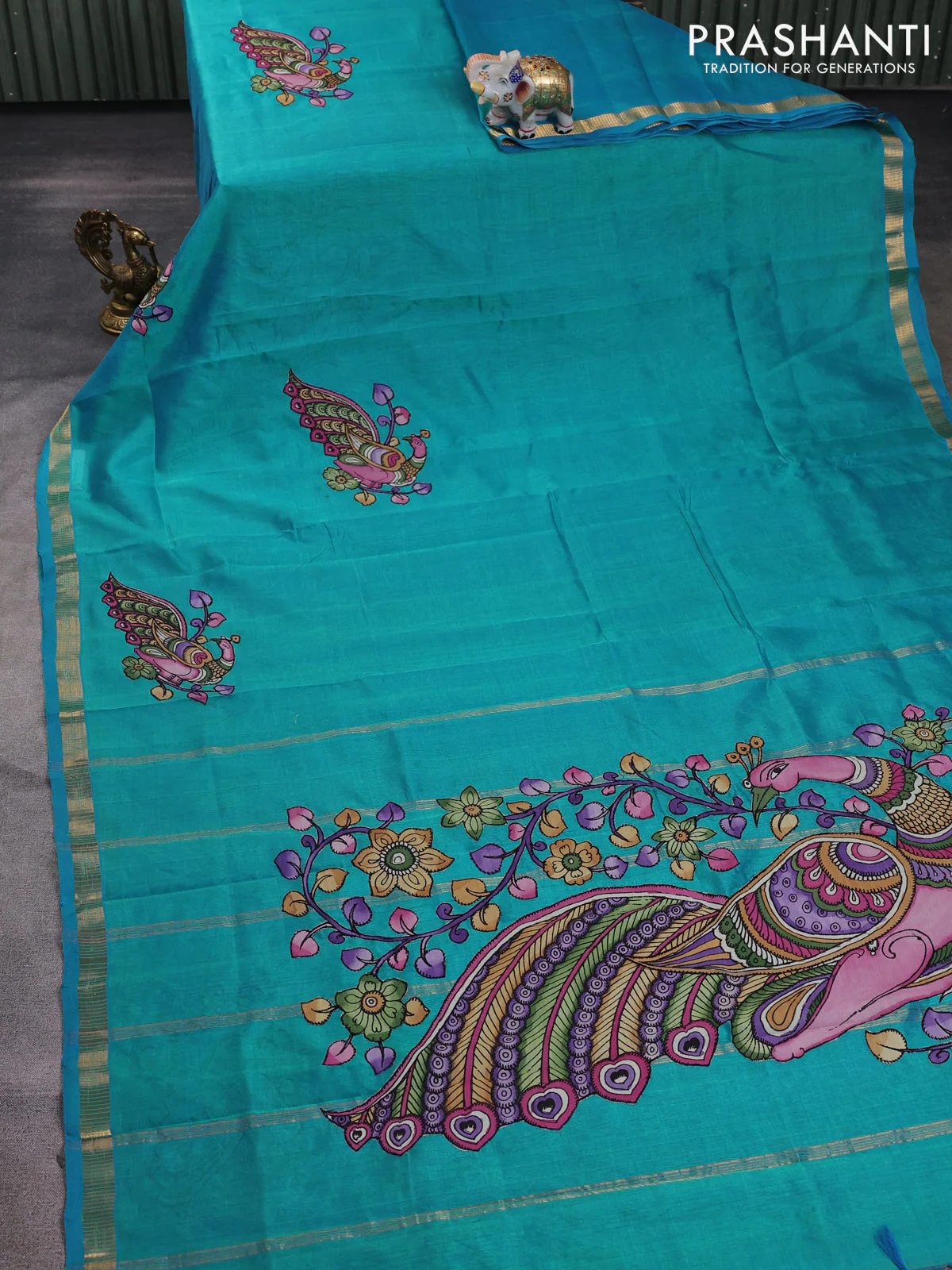 Silk cotton saree dual shade of teal blue with kalamkari applique work and zari woven border - Image 2