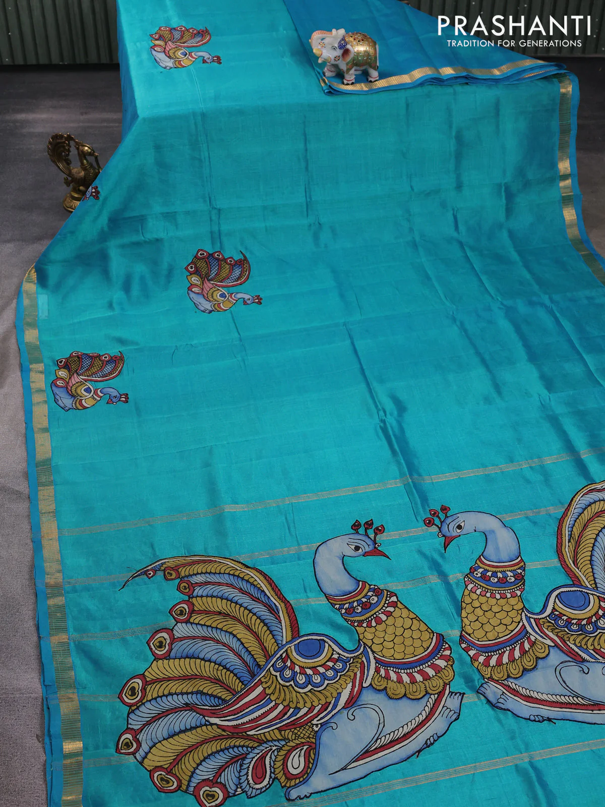 Silk cotton saree dual shade of teal blue with kalamkari applique work and zari woven border - Image 2