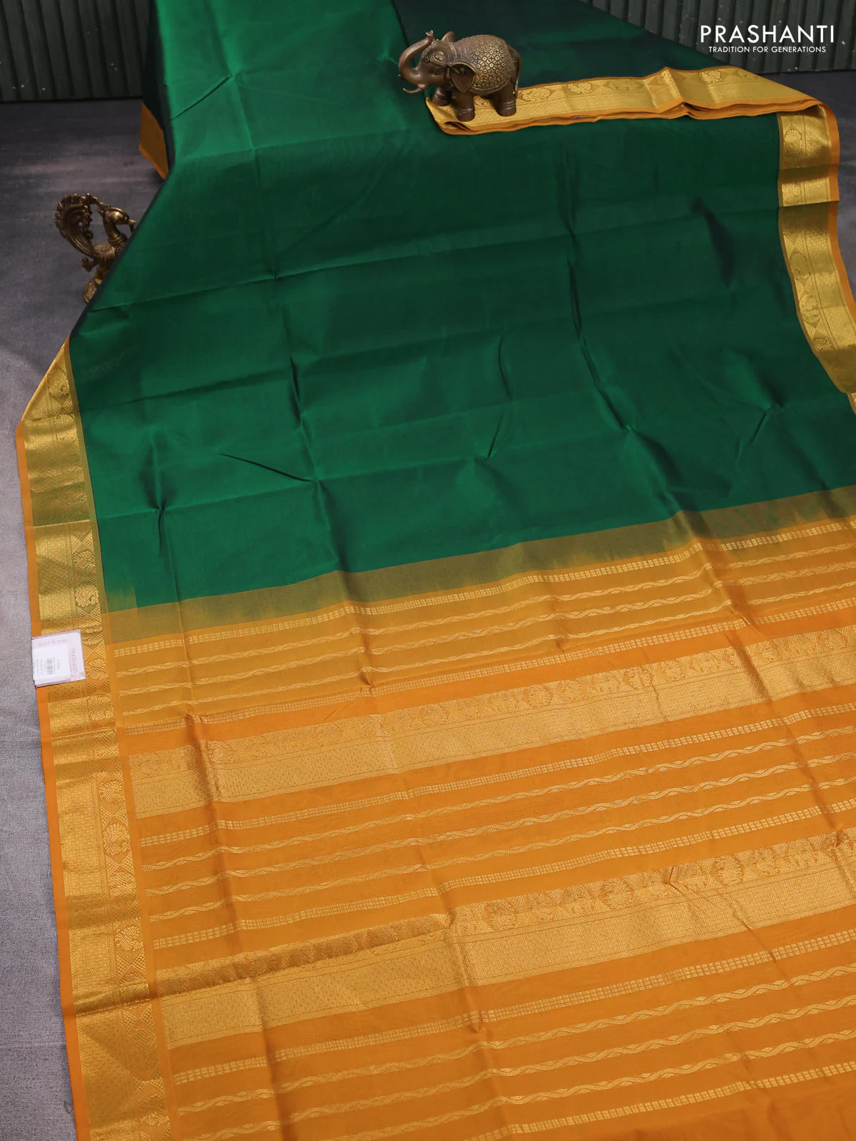 Silk cotton saree green and dark mustard with plain body and zari woven border - Image 2