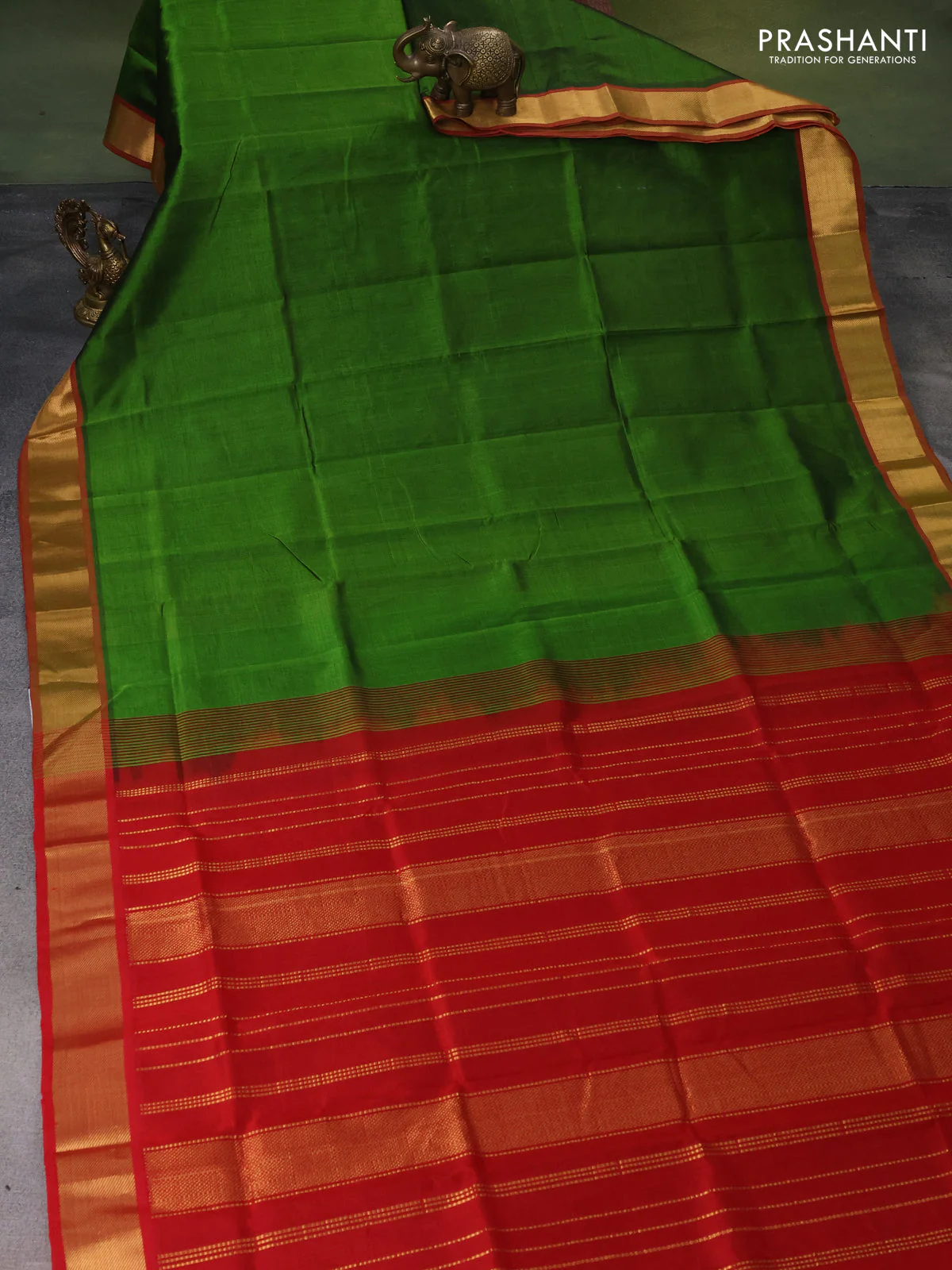 Silk cotton saree green and maroon with plain body and zari woven border - Image 2