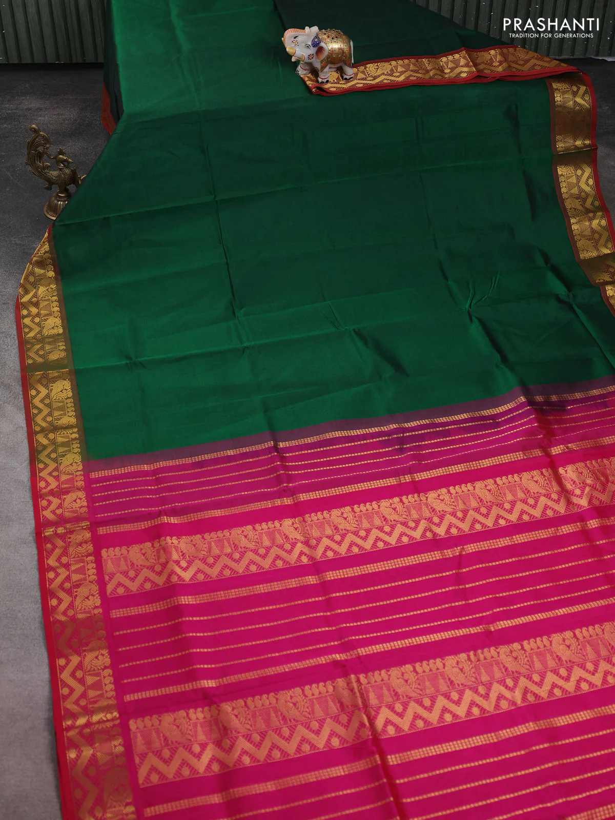 Silk cotton saree green and pink with plain body and zari woven border - Image 2