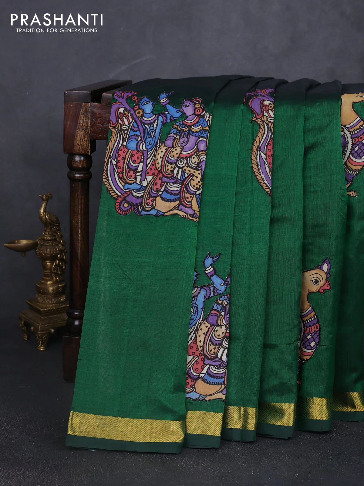 Silk cotton saree green with kalamkari applique work and zari woven border