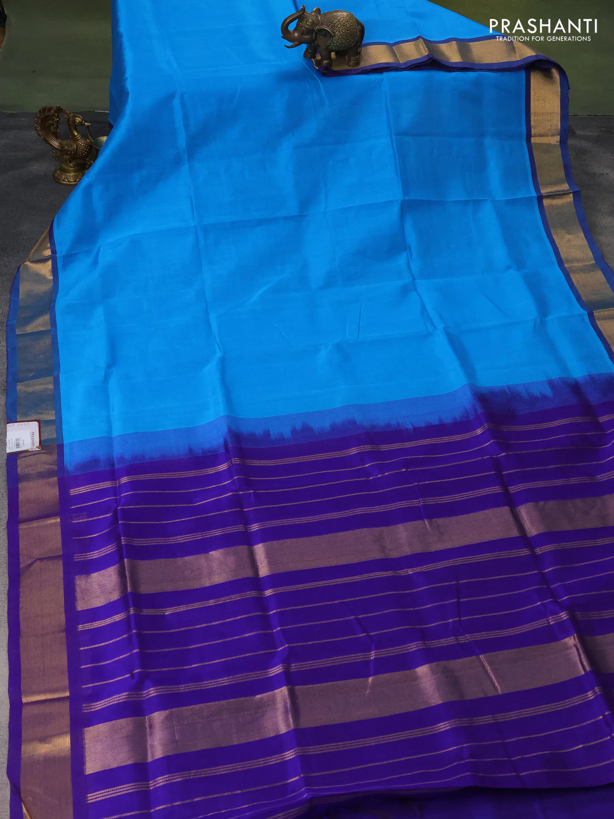 Silk cotton saree light blue and blue with plain body and zari woven border - Image 2