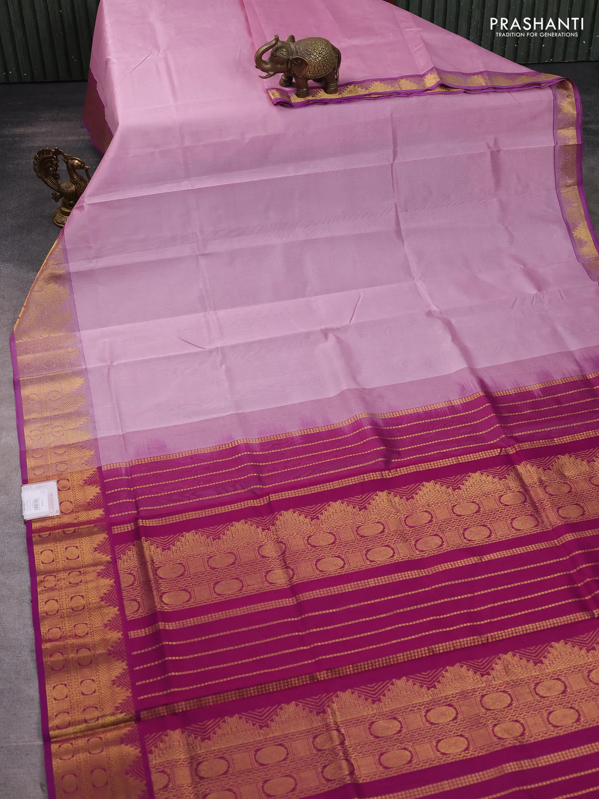 Silk cotton saree light pink and purple with plain body and zari woven border - Image 2