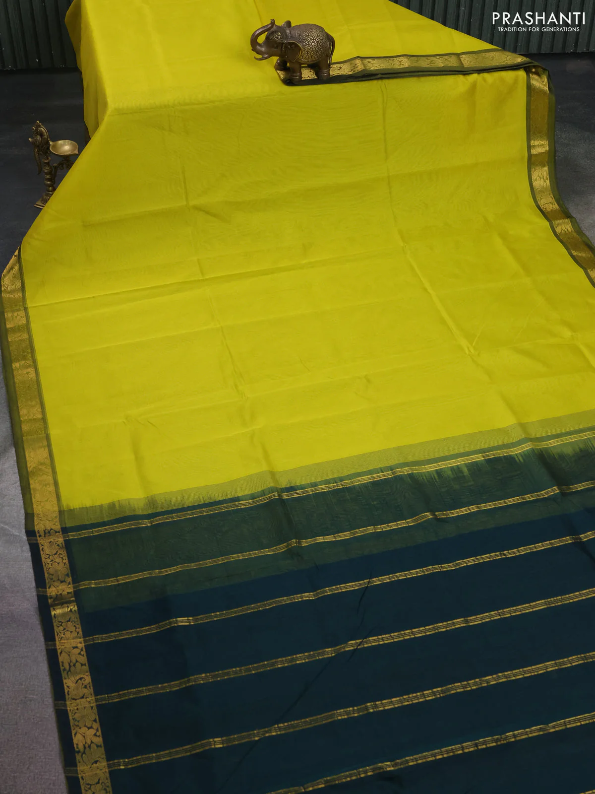 Silk cotton saree lime yellow and bottle green with plain body and zari woven border - Image 2