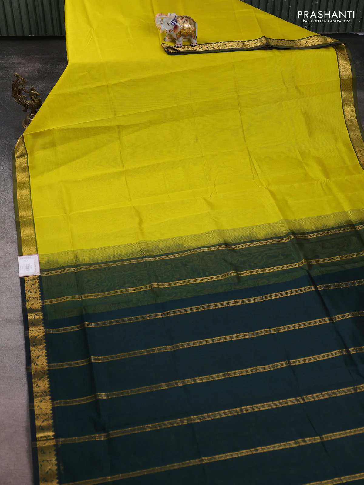 Silk cotton saree lime yellow and bottle green with plain body and zari woven border - Image 2