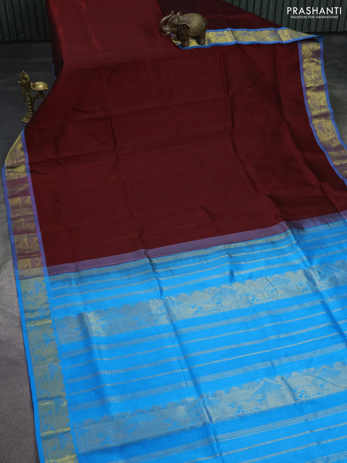 Silk cotton saree maroon and cs blue with plain body and zari woven border - Image 2