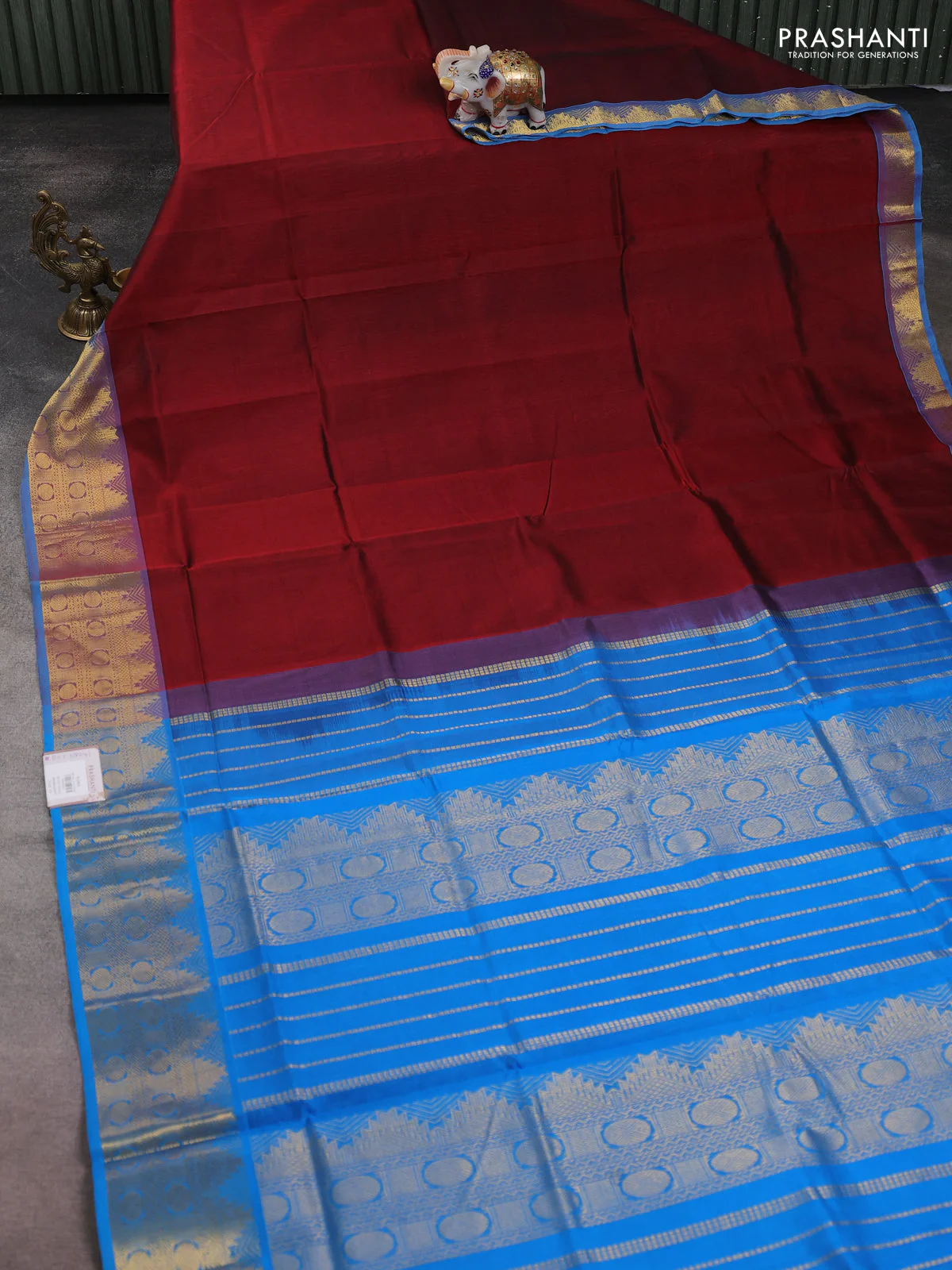 Silk cotton saree maroon and cs blue with plain body and zari woven border - Image 2