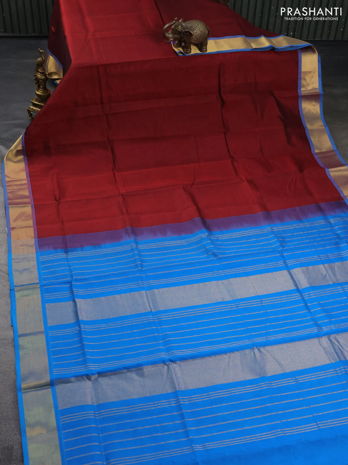 Silk cotton saree maroon and cs blue with plain body and zari woven border - Image 2