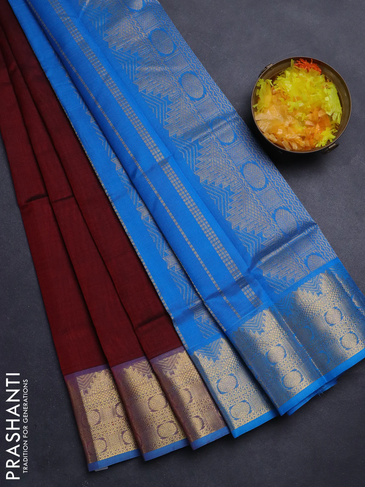 Silk Cotton saree maroon and cs blue with plain body and zari woven border