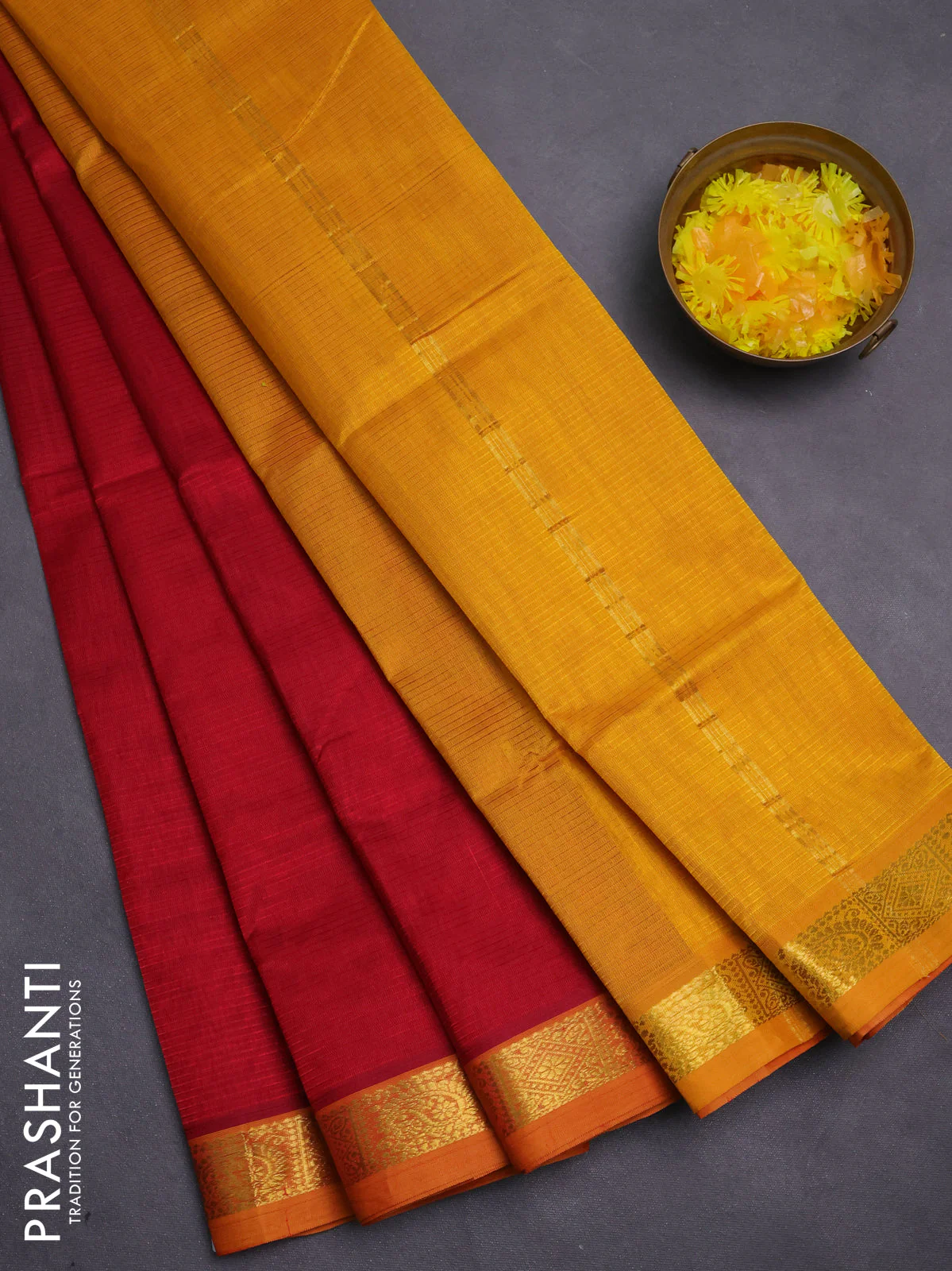 Silk cotton saree maroon and mustard yellow with plain body and zari woven border