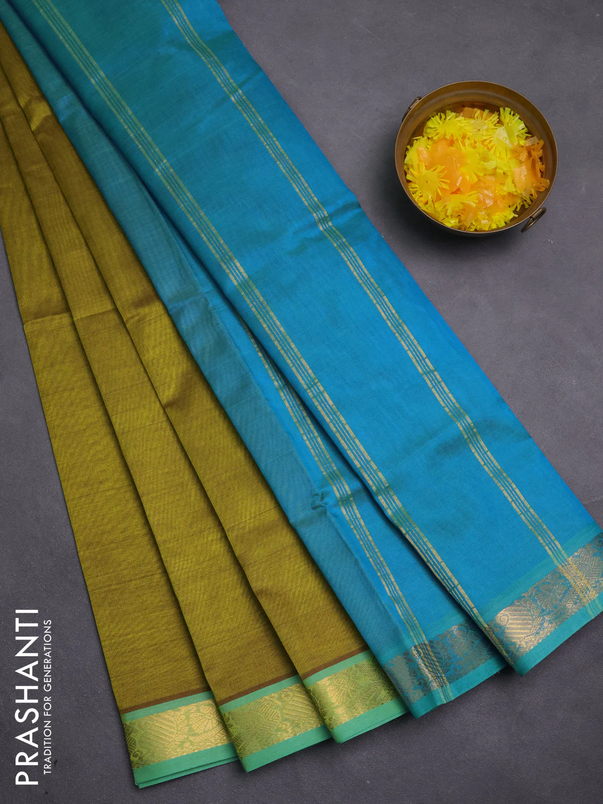 Silk cotton saree mehendi green and cs blue with plain body and zari woven border