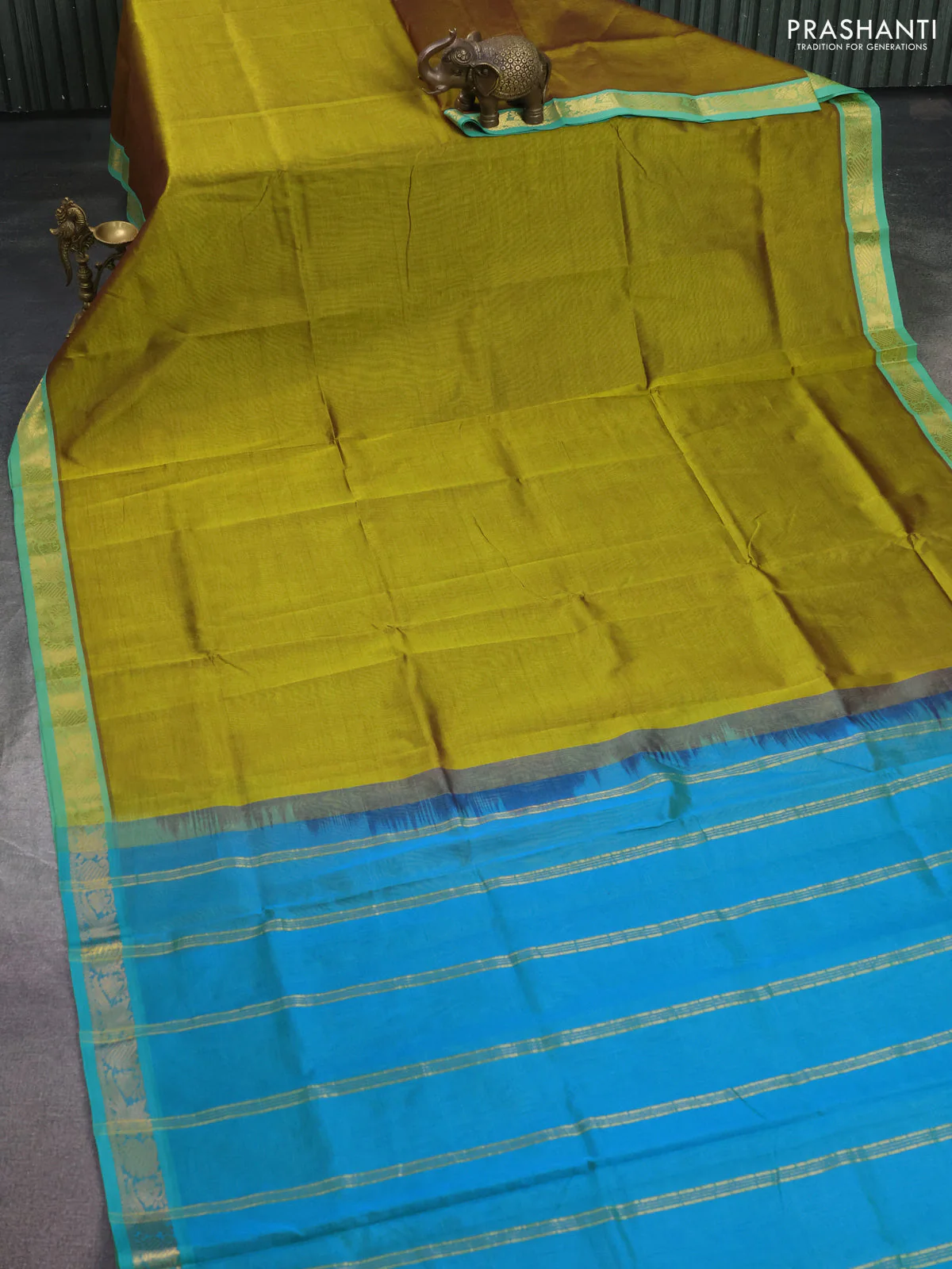 Silk cotton saree mehendi green and cs blue with plain body and zari woven border - Image 2