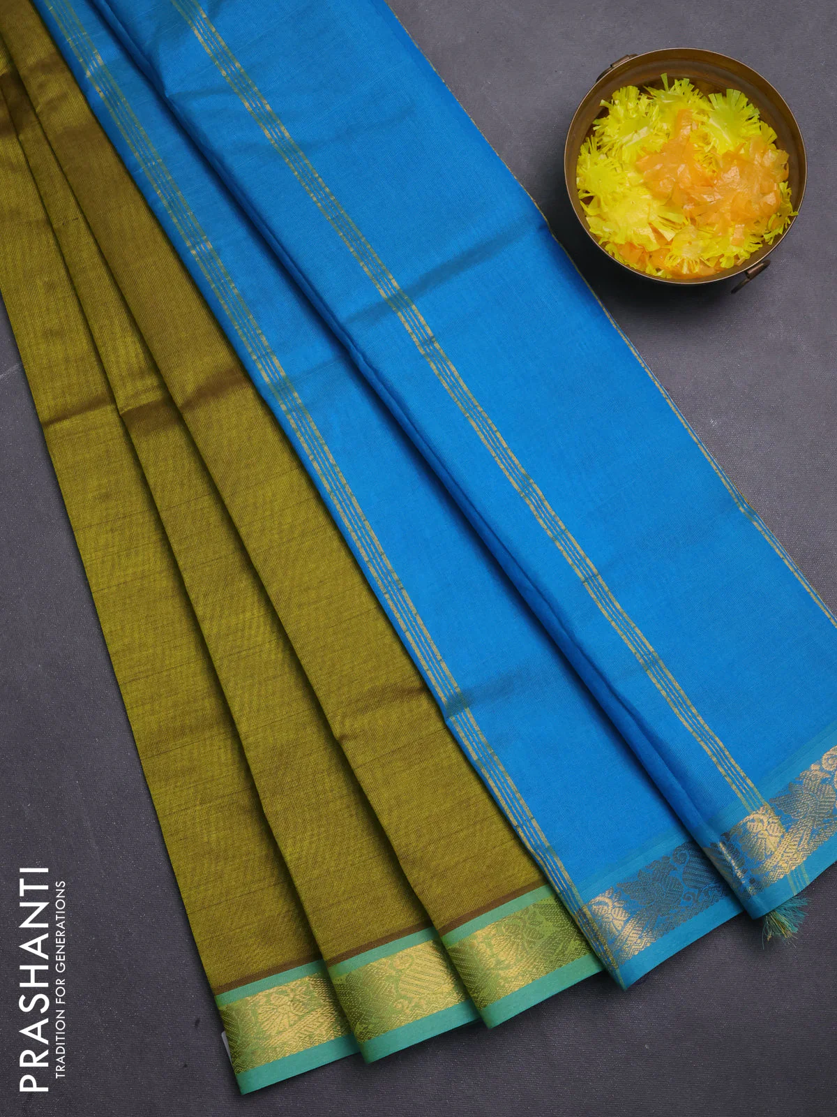 Silk cotton saree mehendi green and cs blue with plain body and zari woven border