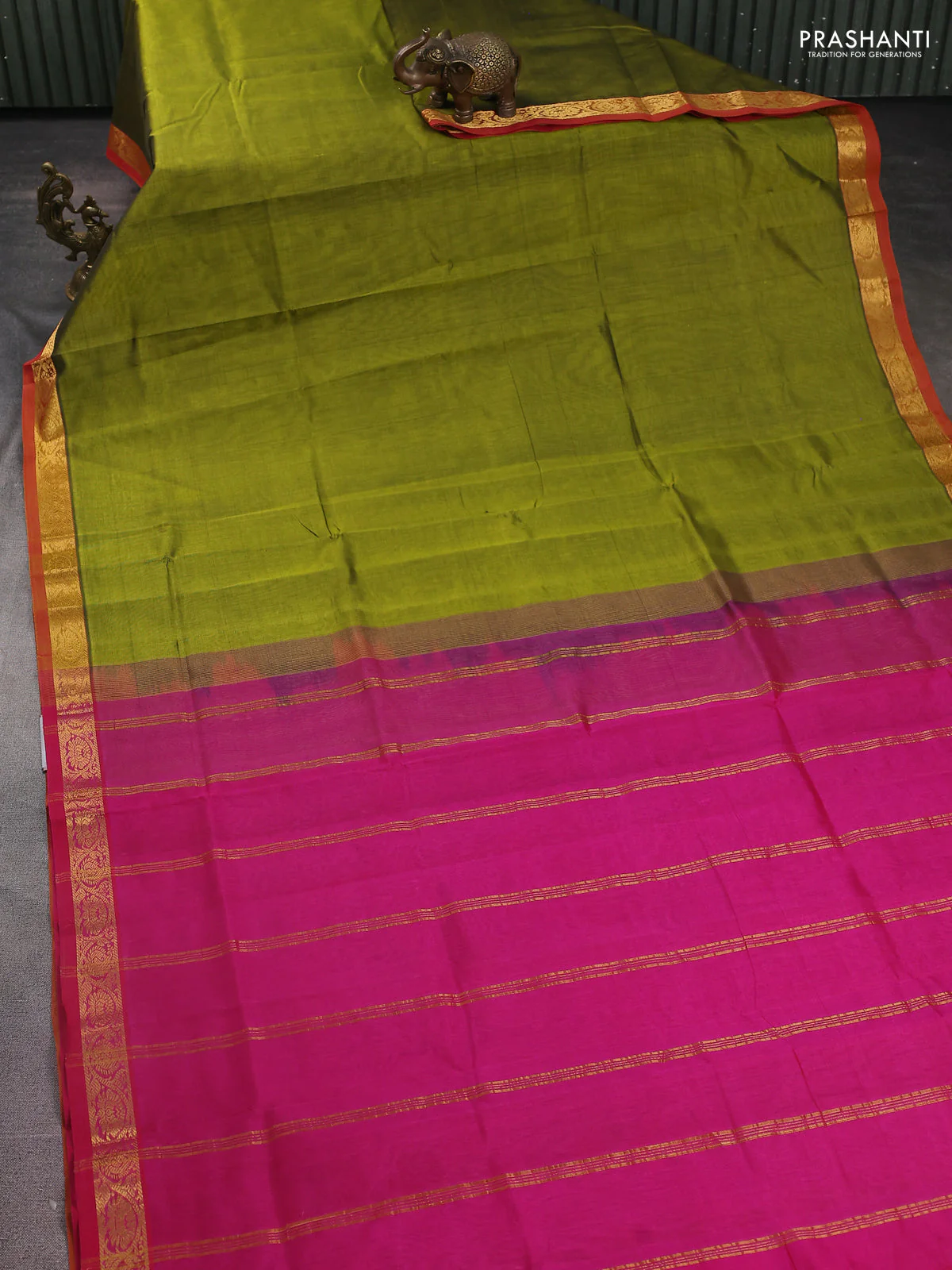 Silk Cotton saree mehendi green and pink with plain body and zari woven border - Image 2