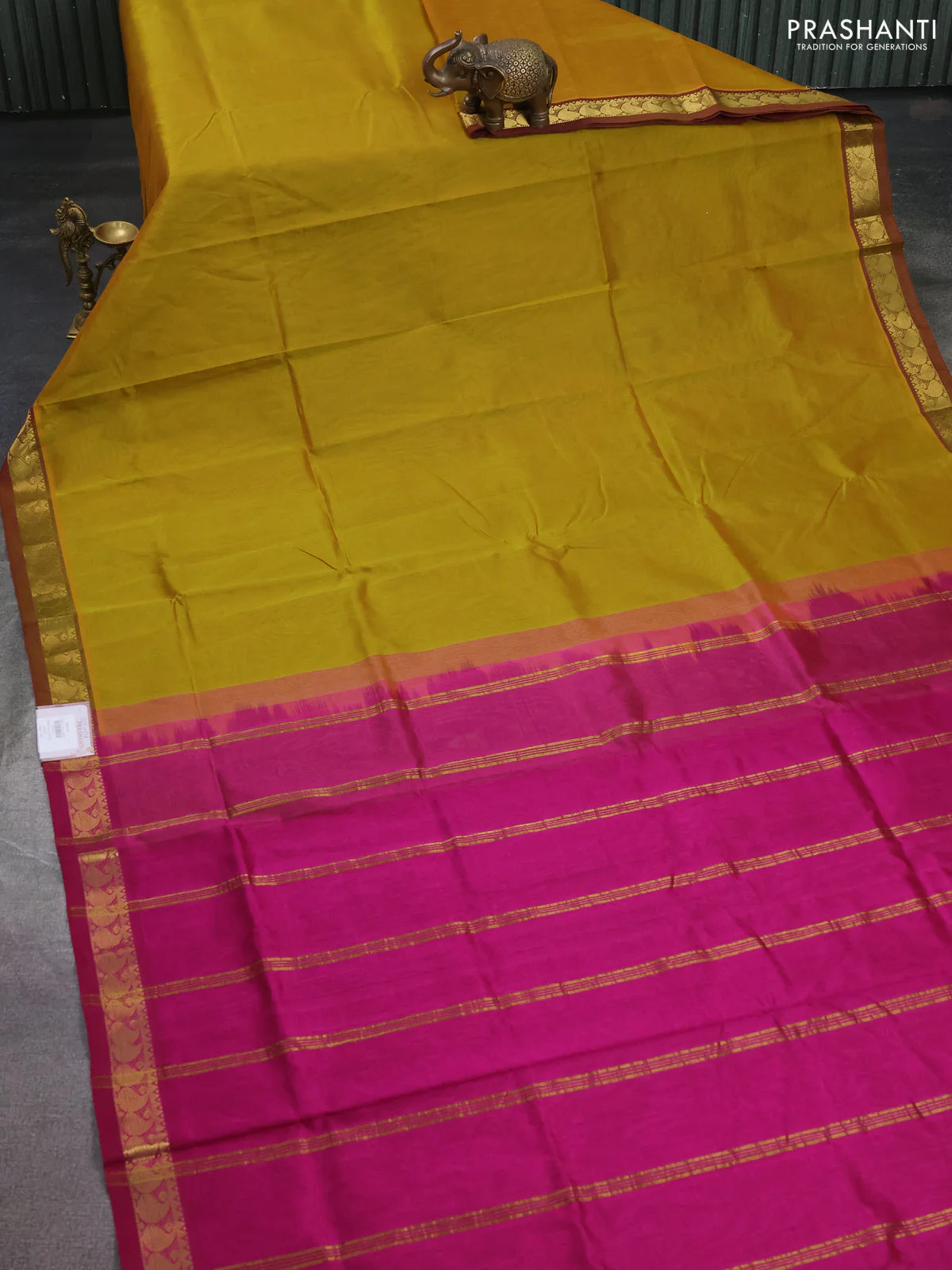 Silk cotton saree mustard green and pink with plain body and paisley zari woven border - Image 2