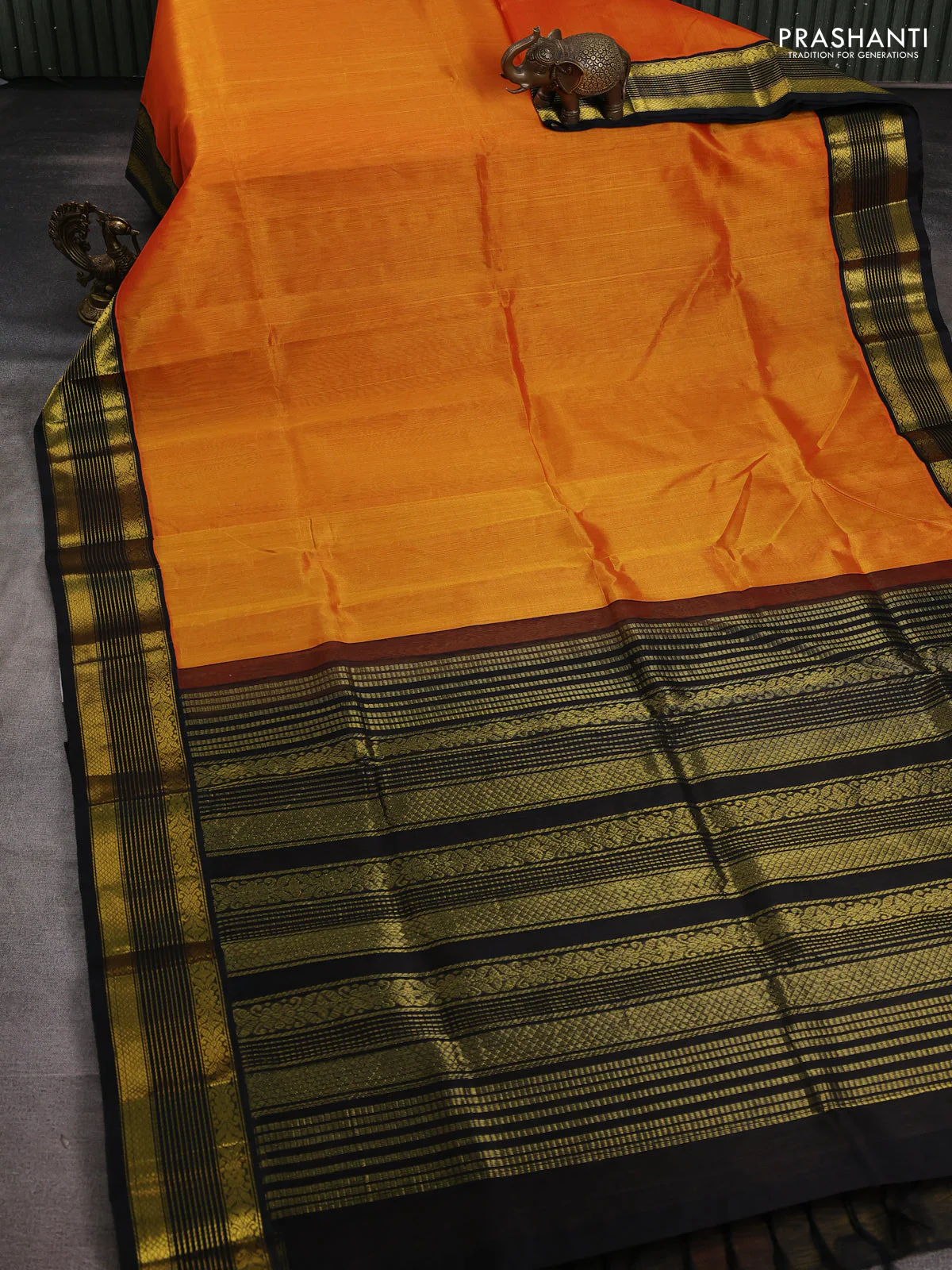 Silk cotton saree mustard yellow and black with plain body and zari woven korvai border - Image 2