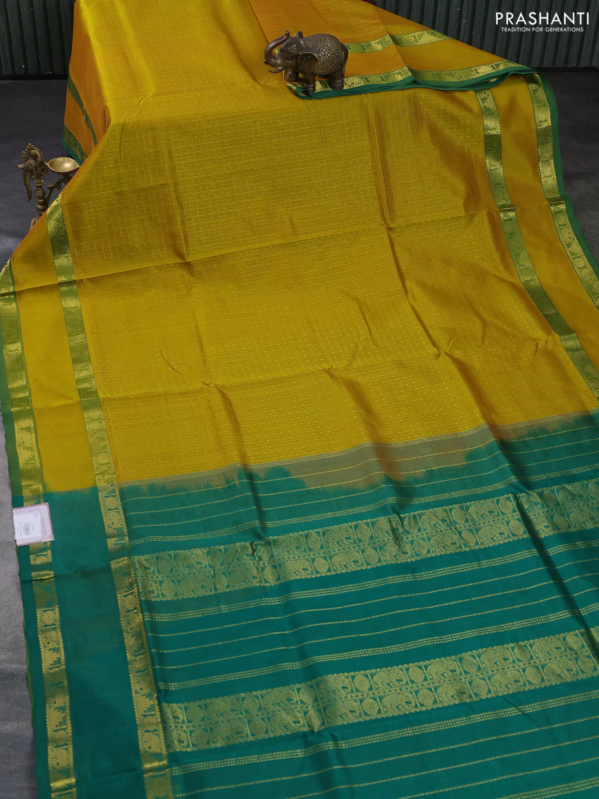 Silk cotton saree mustard yellow and green with allover lakshadeepam pattern and rettapet zari woven border - Image 2