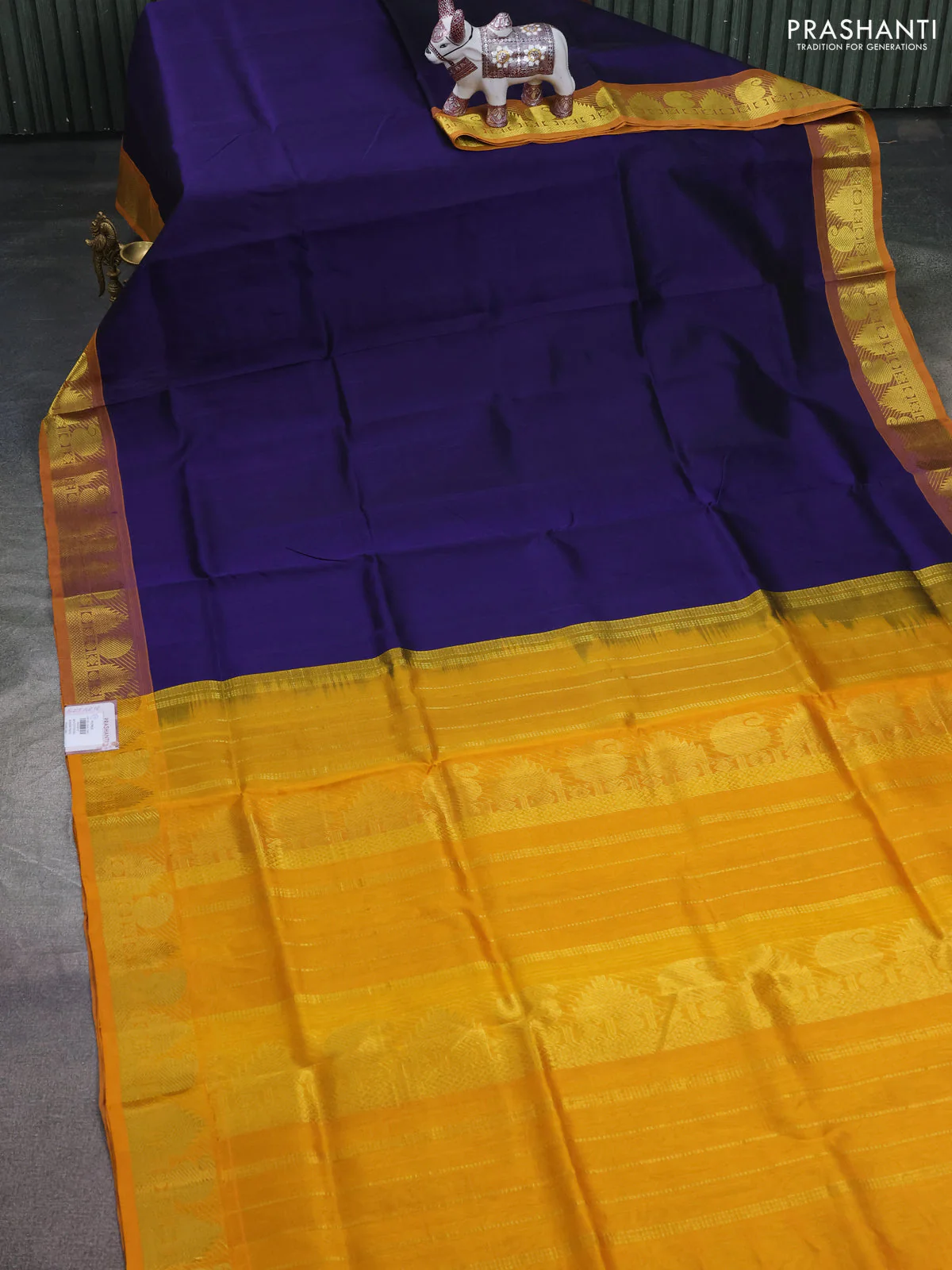 Silk cotton saree navy blue and mustard yellow with plain body and temple & paisley zari woven butta border - Image 2