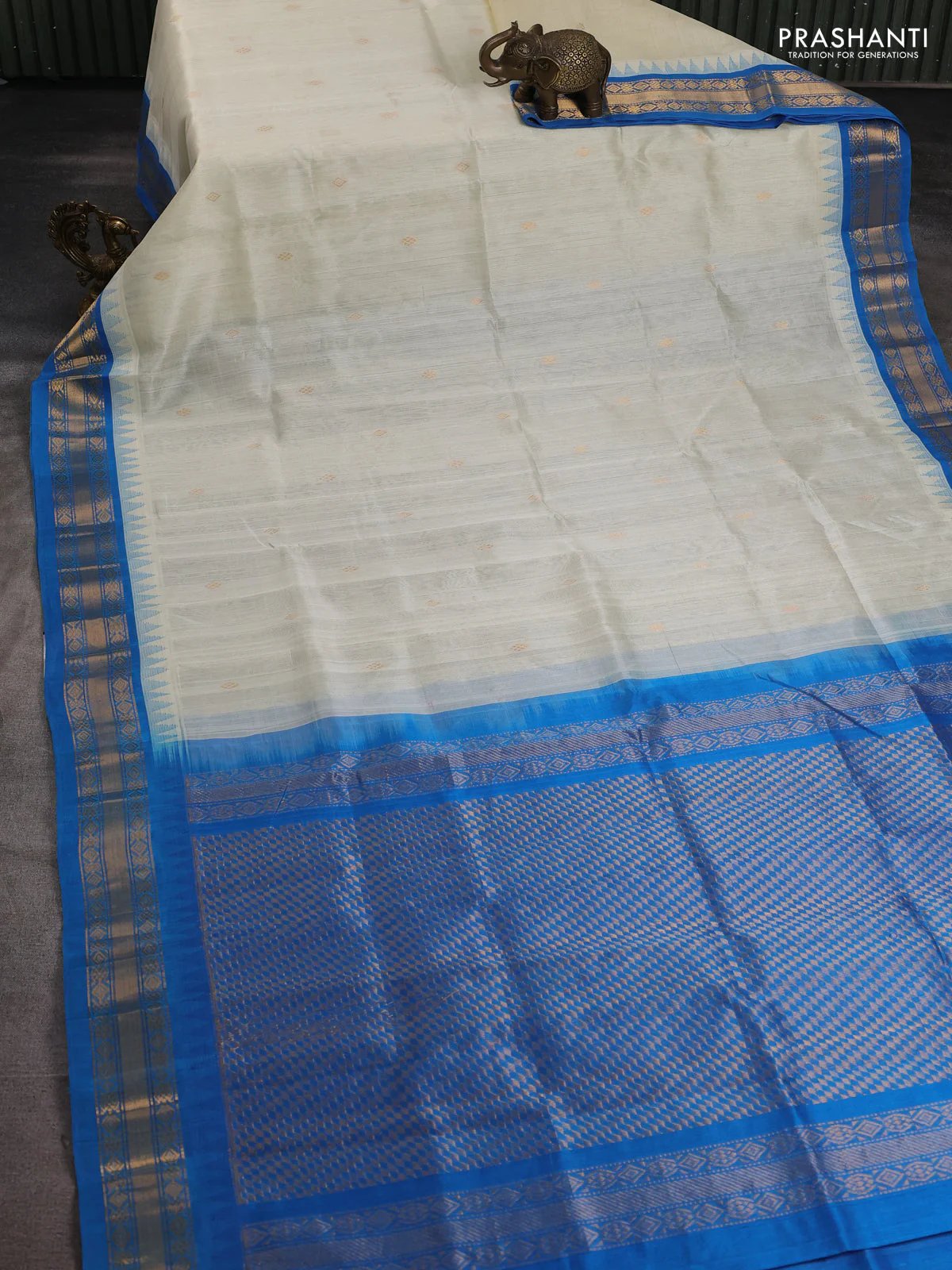 Silk cotton saree off white and cs blue with zari woven buttas and temple design zari woven border - Image 2
