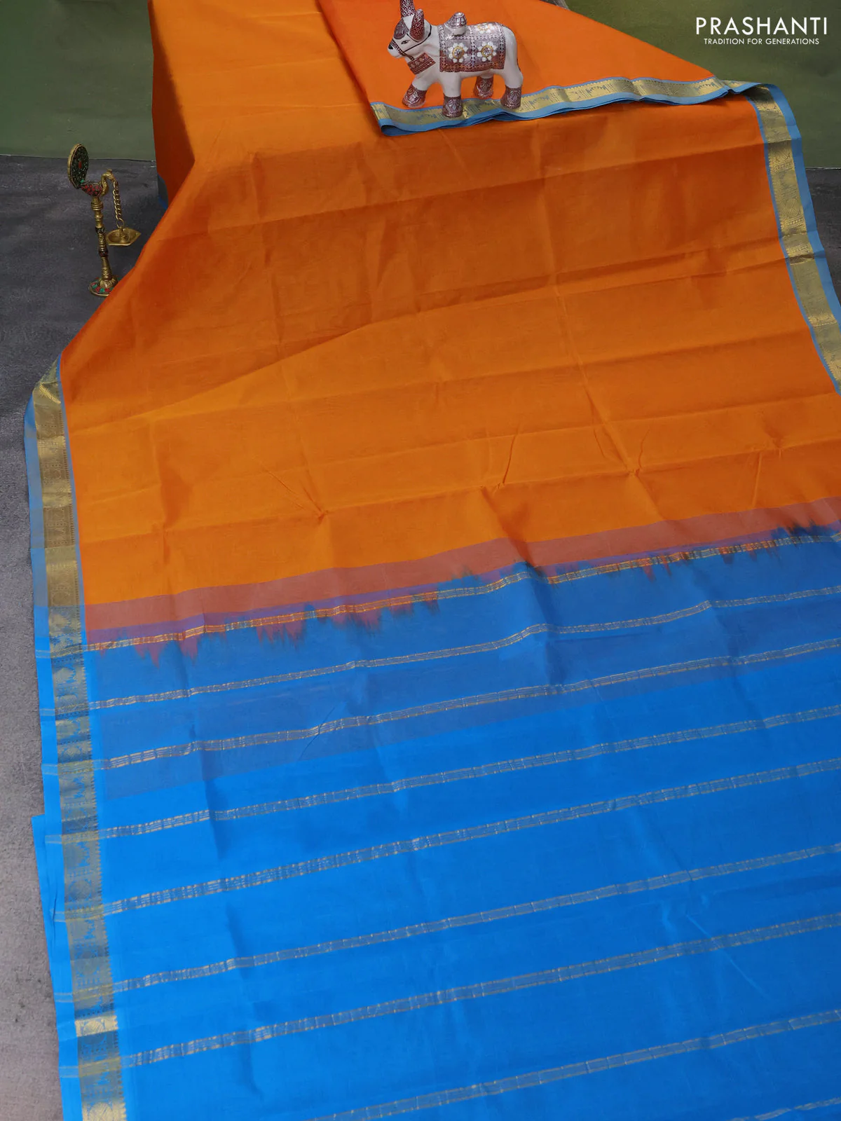 Silk Cotton saree orange and cs blue with plain body and zari woven border - Image 2