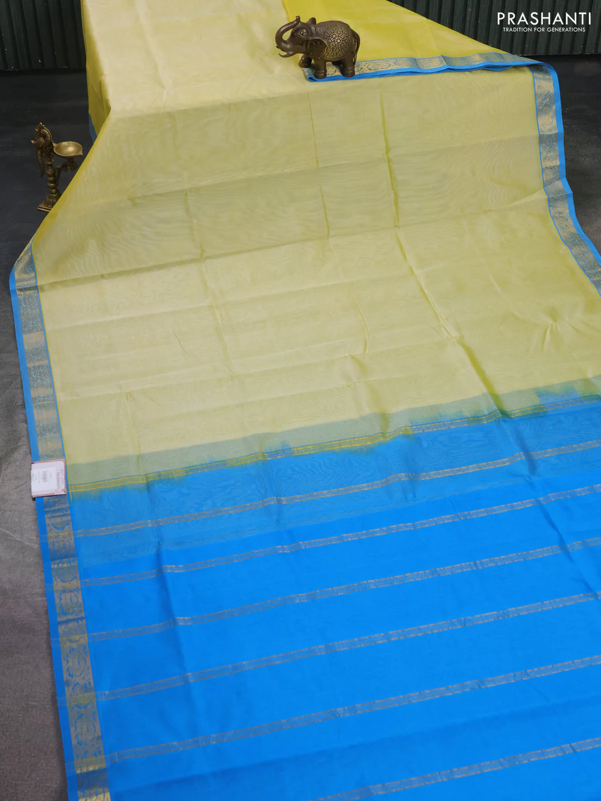Silk cotton saree pale yellow and cs blue with plain body and zari woven border - Image 2