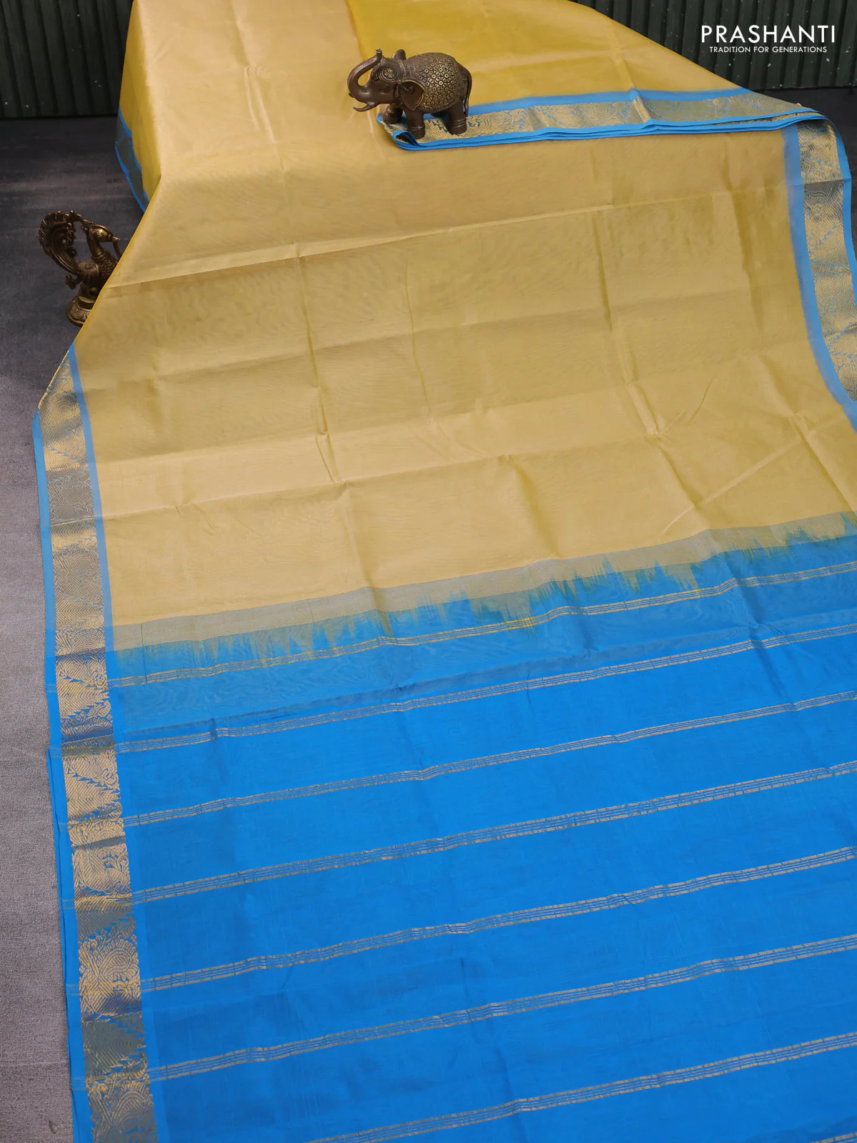 Silk cotton saree pale yellow and cs blue with plain body and zari woven border - Image 2