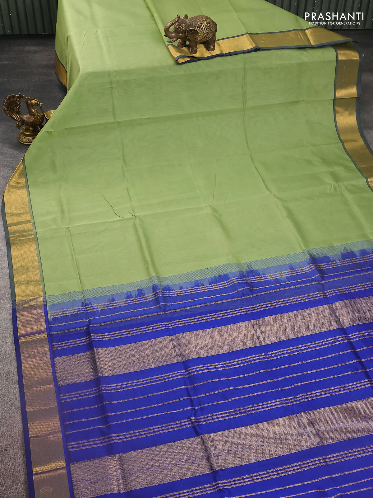 Silk cotton saree pastel green and blue with plain body and zari woven border - Image 2