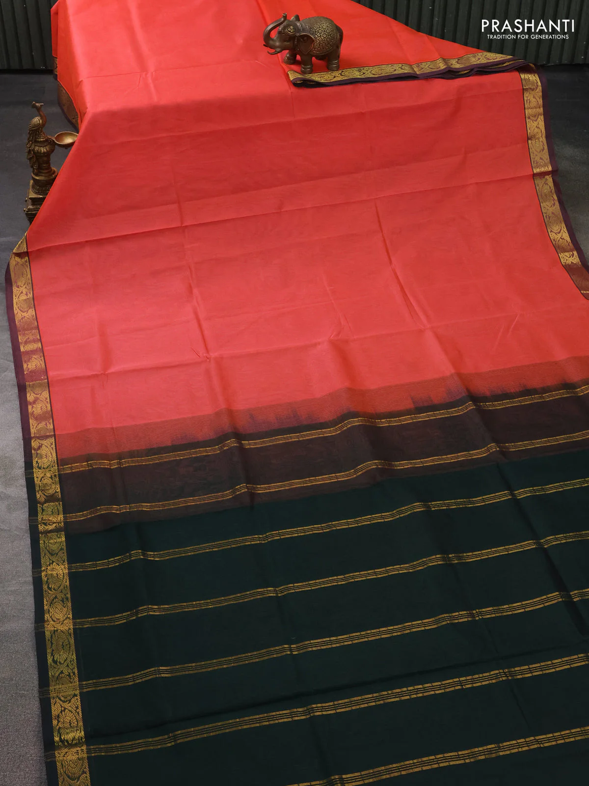Silk cotton saree peach orange and bottle green with plain body and zari woven border - Image 2