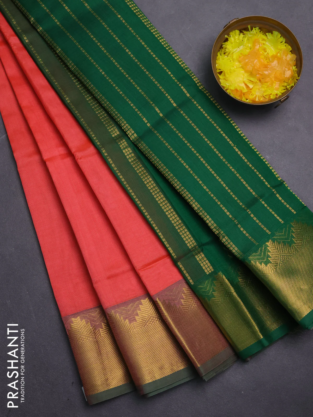 Silk cotton saree peach orange and green with plain body and zari woven border
