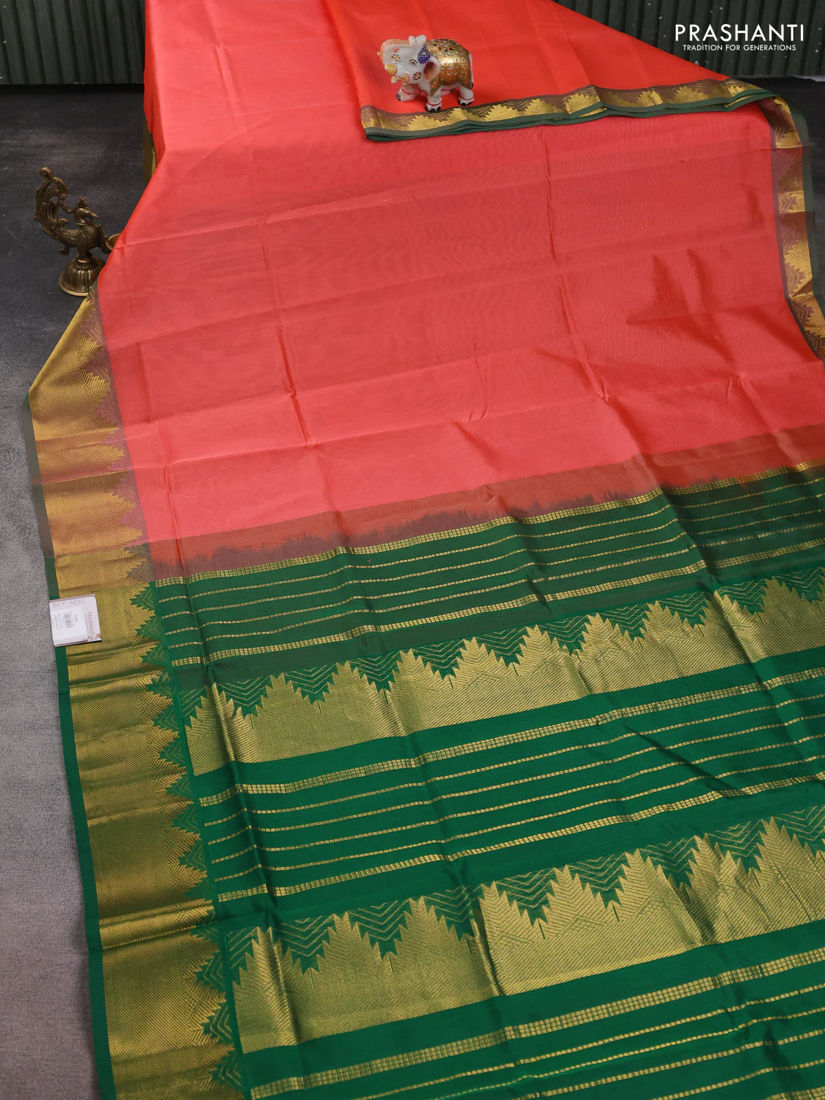 Silk cotton saree peach orange and green with plain body and zari woven border - Image 2