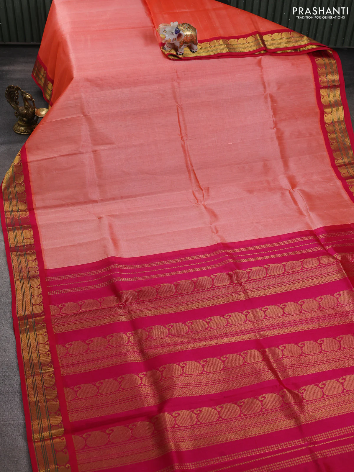 Silk cotton saree peach orange and pink with plain body and paisley zari woven korvai border - Image 2