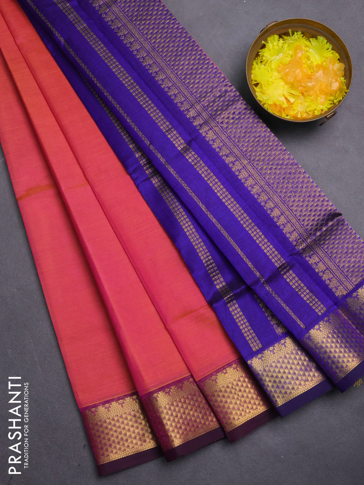 Silk cotton saree peach pink and blue with plain body and temple zari woven border