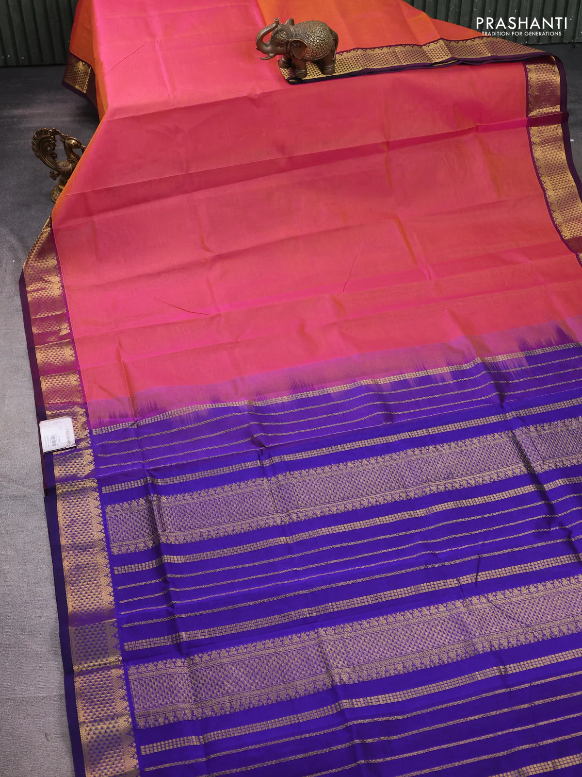 Silk cotton saree peach pink and blue with plain body and temple zari woven border - Image 2