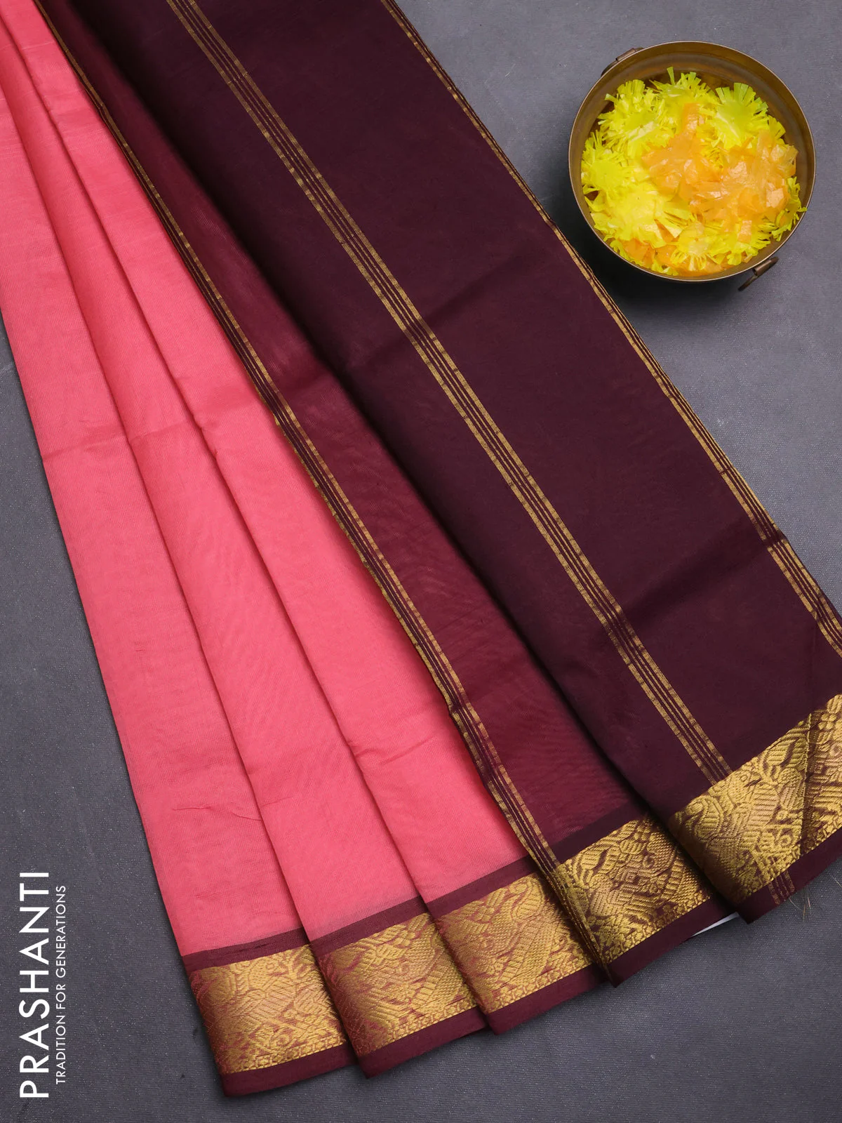 Silk cotton saree peach pink and deep maroon with plain body and zari woven border