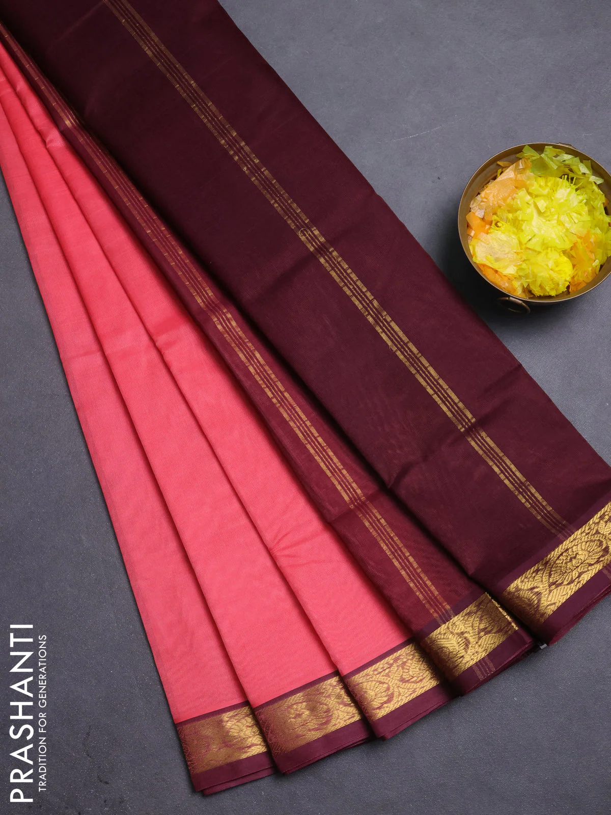 Silk cotton saree peach pink and deep maroon with plain body and zari woven border