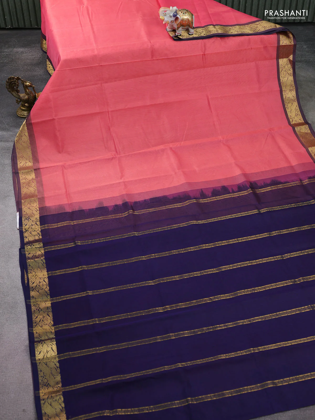 Silk Cotton saree peach pink and navy blue with plain body and zari woven border - Image 2