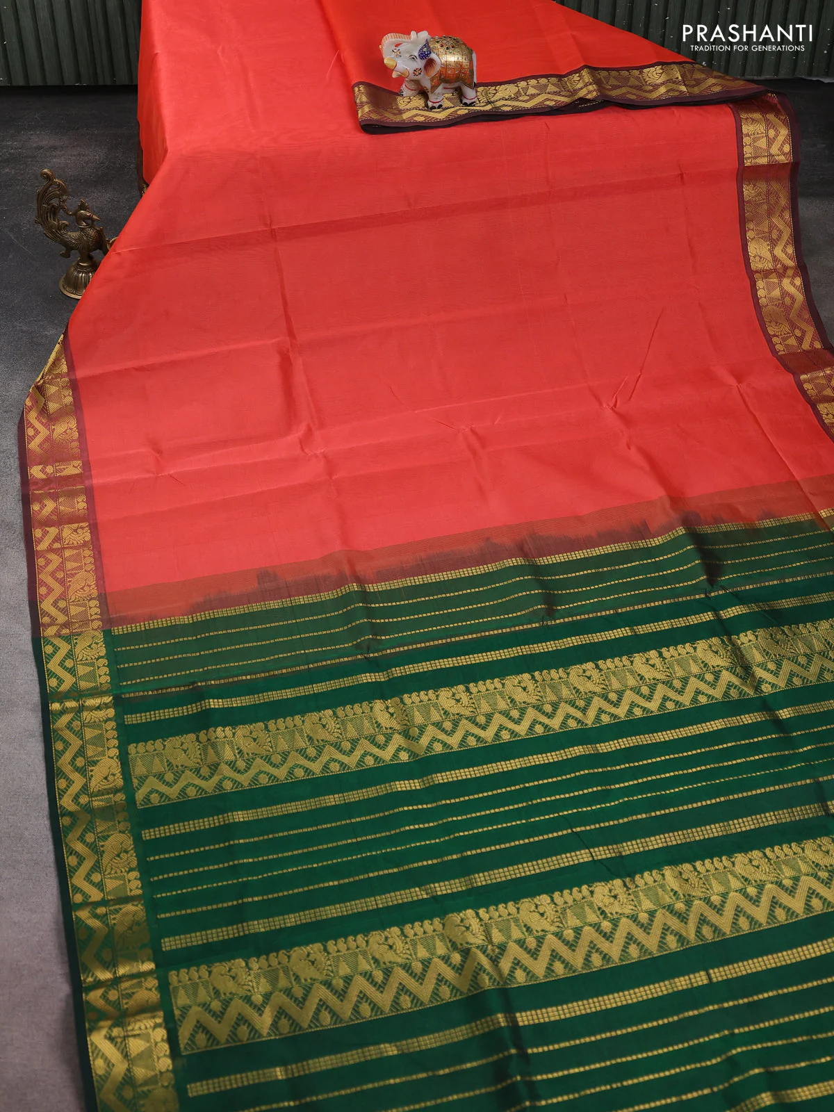 Silk cotton saree peach shade and bottle green with plain body and zari woven border - Image 2