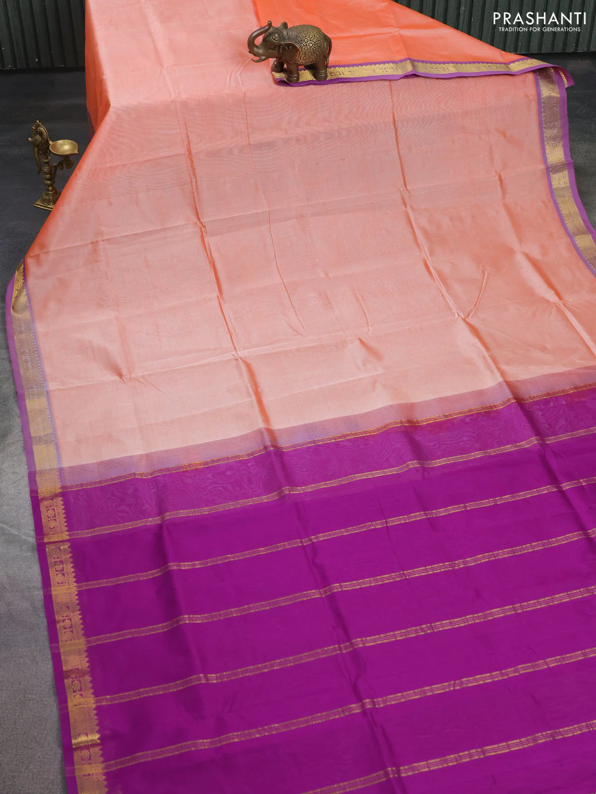 Silk cotton saree peach shade and purple with plain body and zari woven border - Image 2
