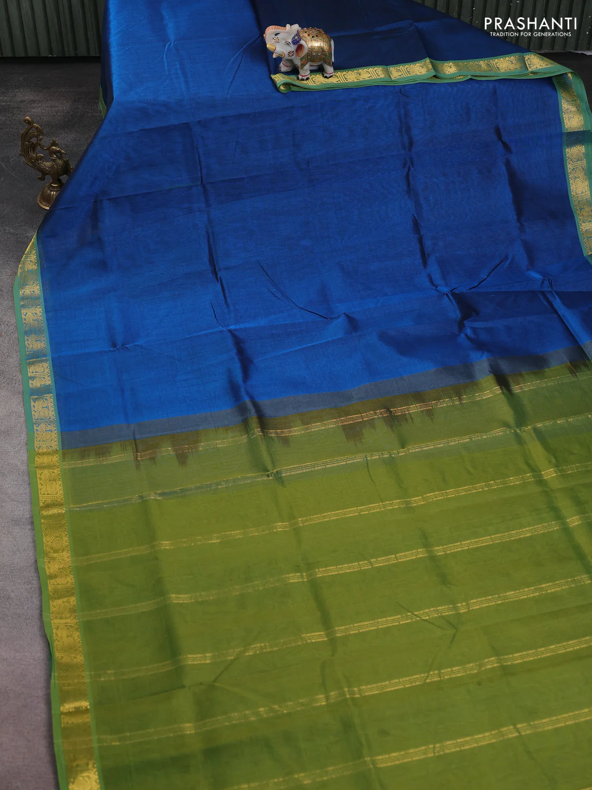 Silk cotton saree peacock blue and green shade with plain body and zari woven border - Image 2