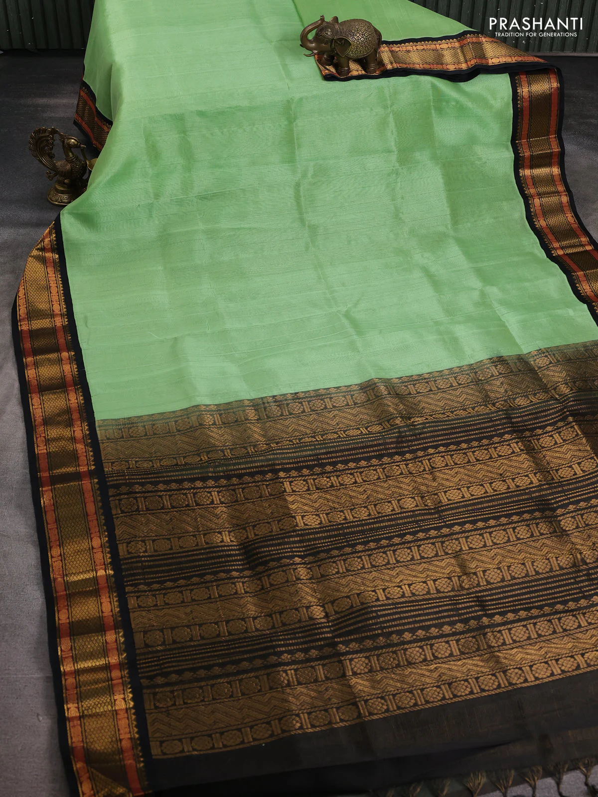 Silk cotton saree piata green and black with plain body and temple design zari woven border - Image 2