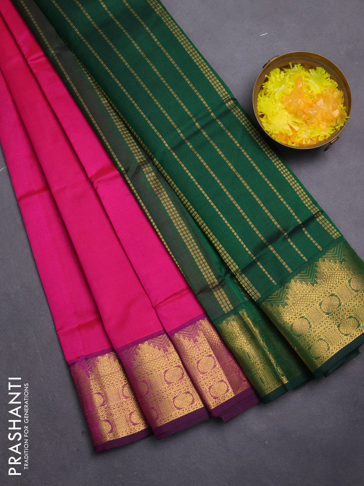 Silk cotton saree pink and green with plain body and zari woven border