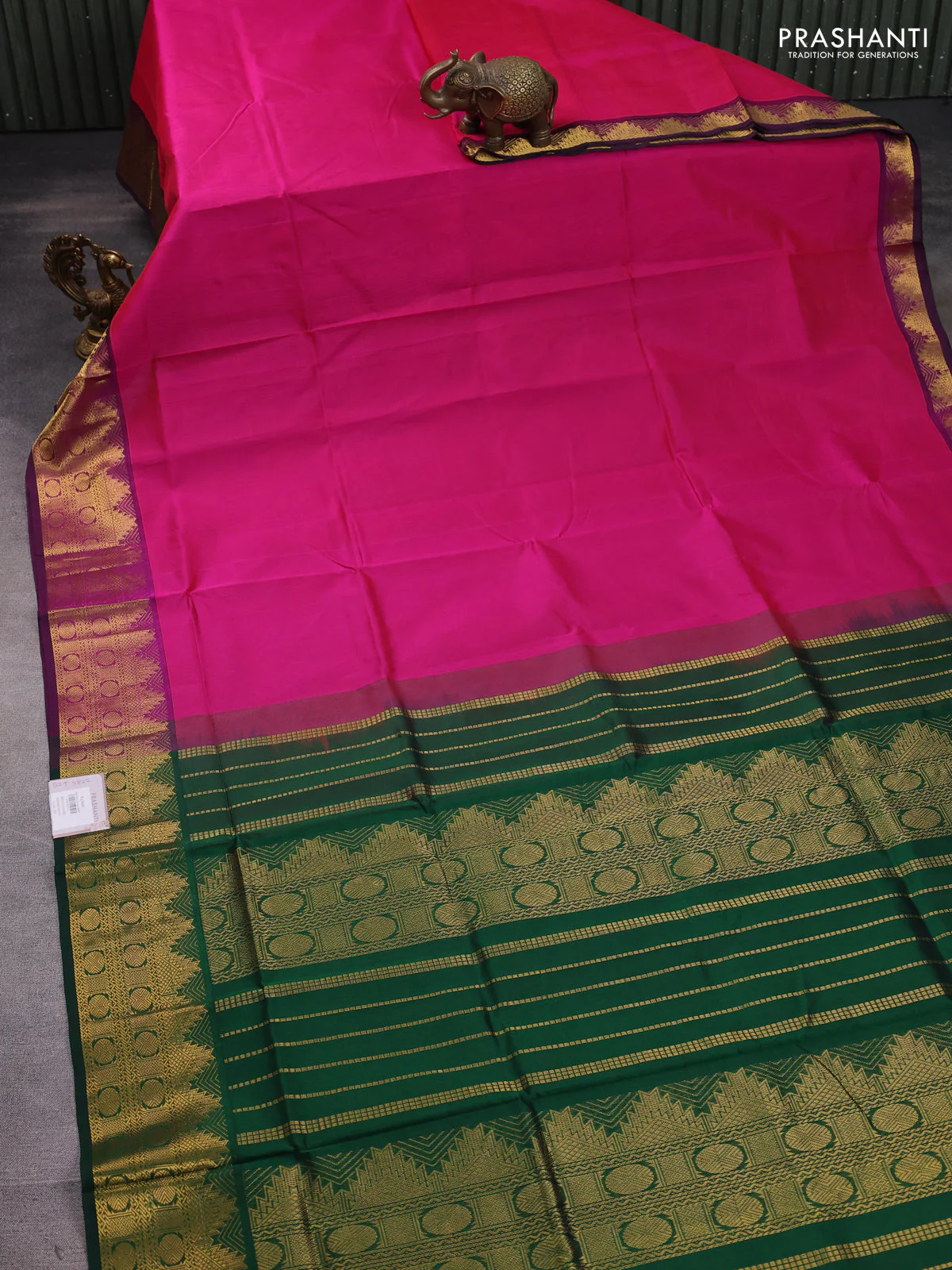 Silk cotton saree pink and green with plain body and zari woven border - Image 2