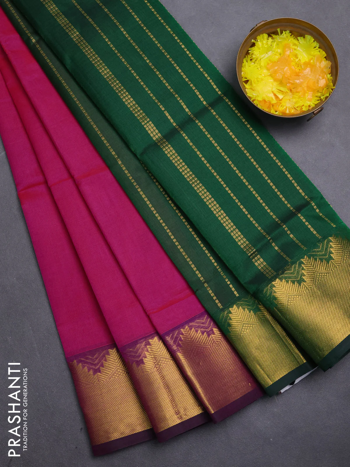 Silk cotton saree pink and green with plain body and zari woven border