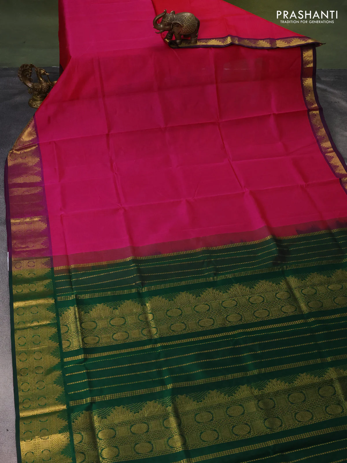 Silk cotton saree pink and green with plain body and zari woven border - Image 2