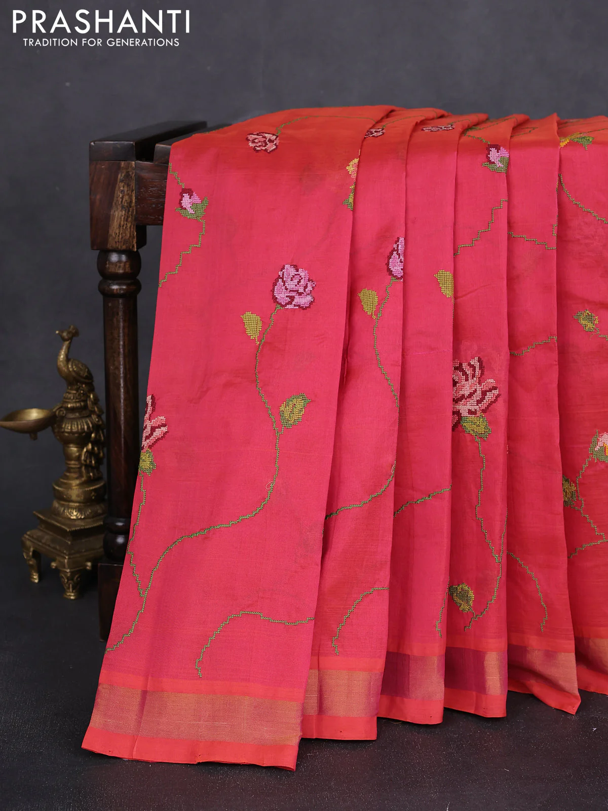 Silk cotton saree pinkish orange with allover floral embriodery and zari woven border - Image 2