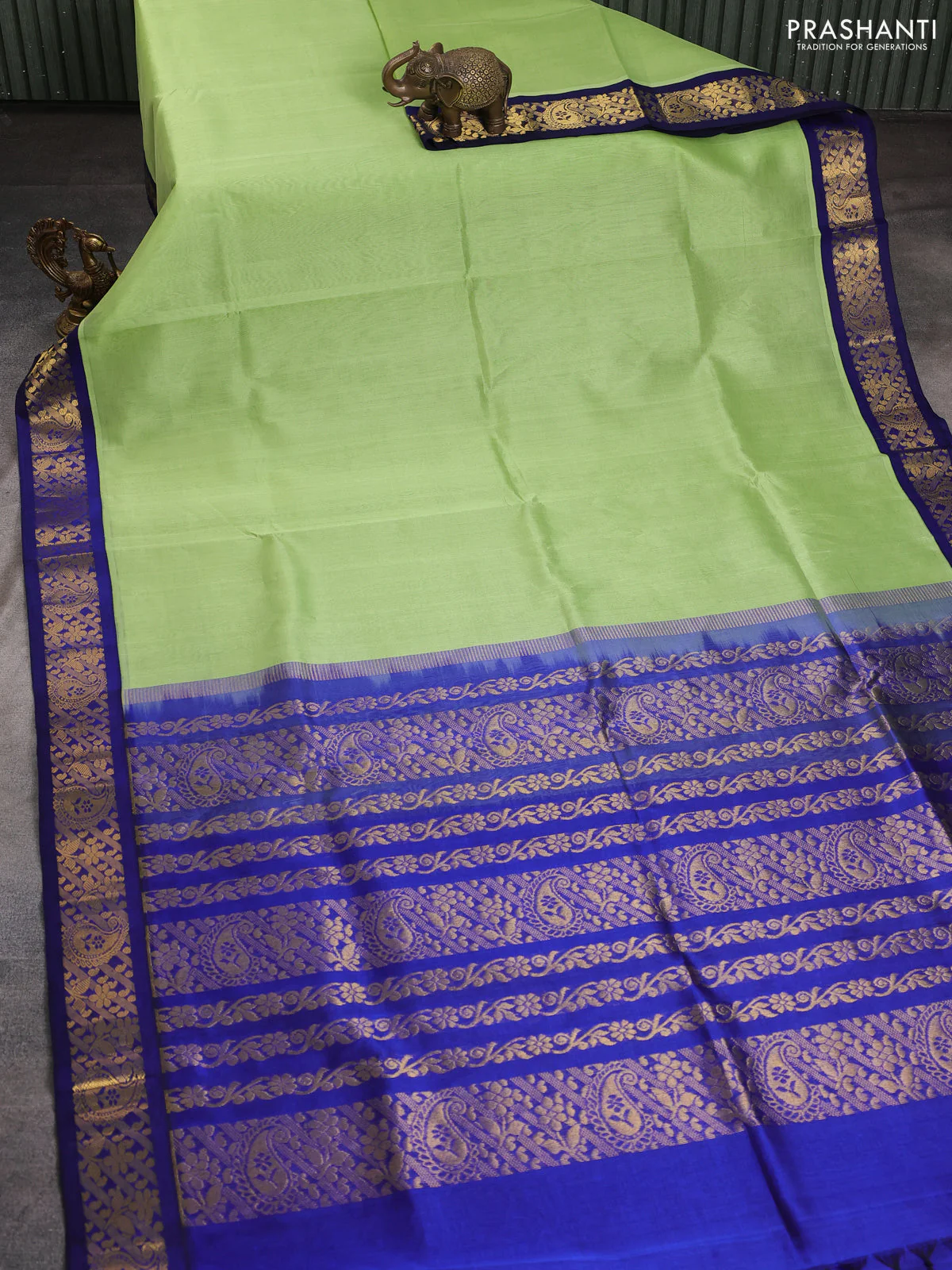 Silk cotton saree pista green and blue with plain body and zari woven korvai border - Image 2