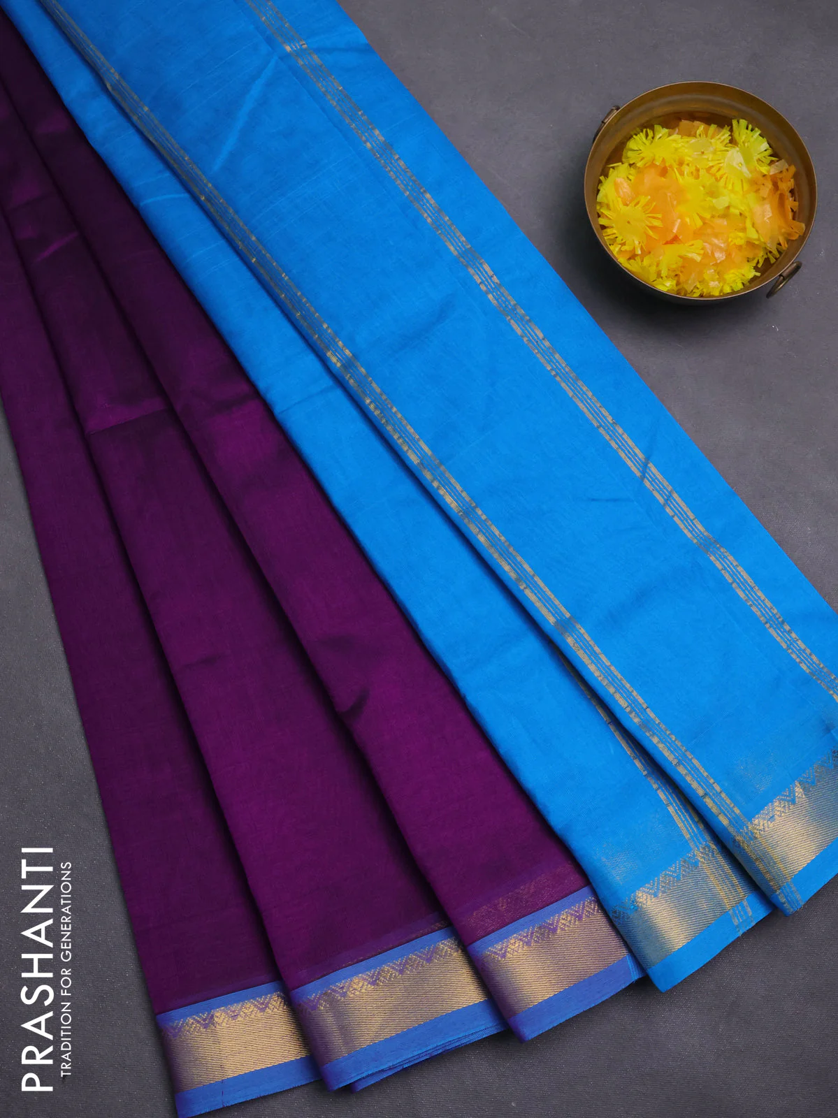 Silk cotton saree purple and cs blue with plain body and zari woven border